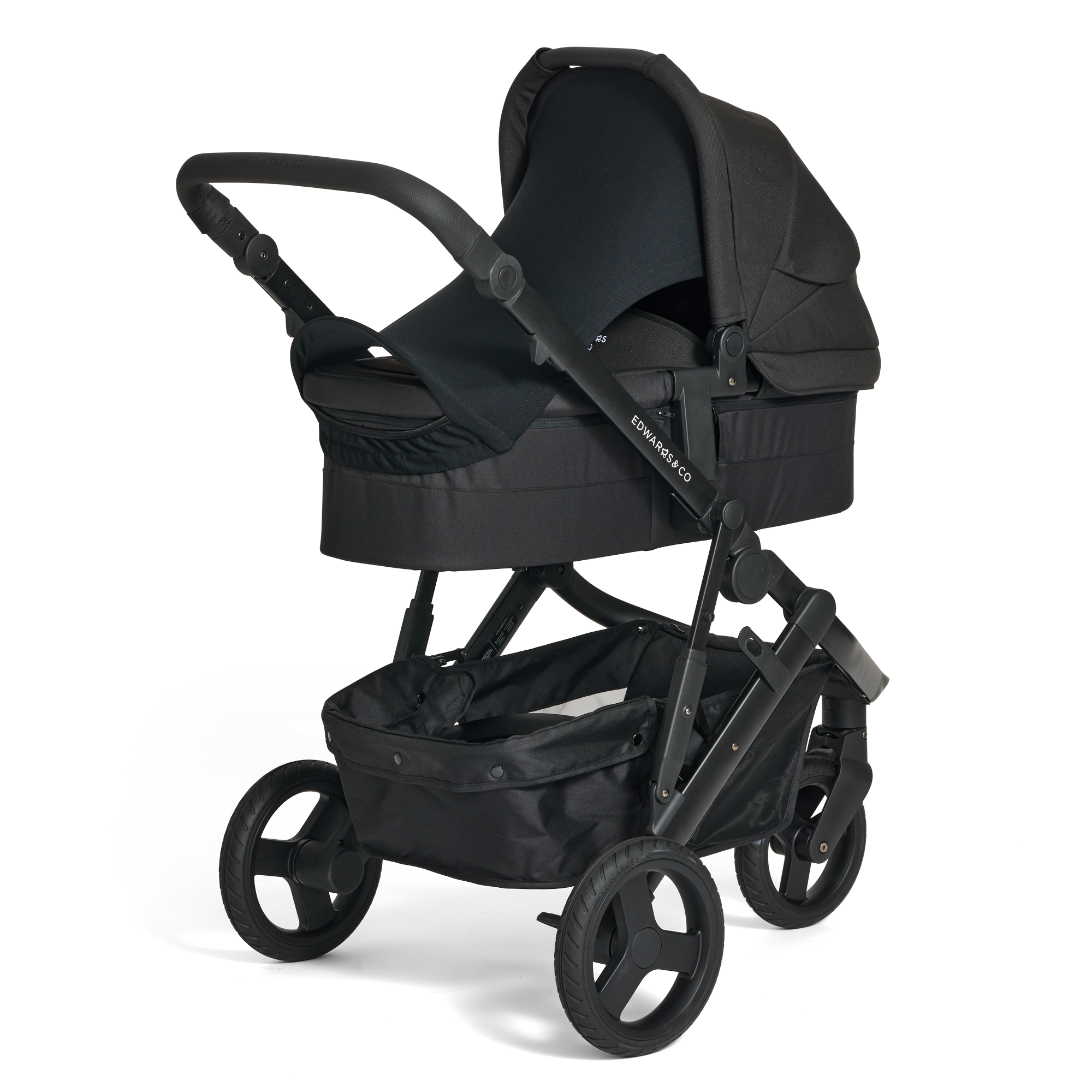 Black Oscar Nu stroller with the Carry Cot 3 on a white background