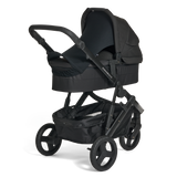 Black Oscar Nu stroller with the Carry Cot 3 on a white background