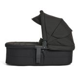Black baby Carry Cot 3 with canopy on a white background on a side view