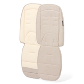 Two beige pram seat covers on a white background