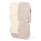 Two beige pram seat covers on a white background
